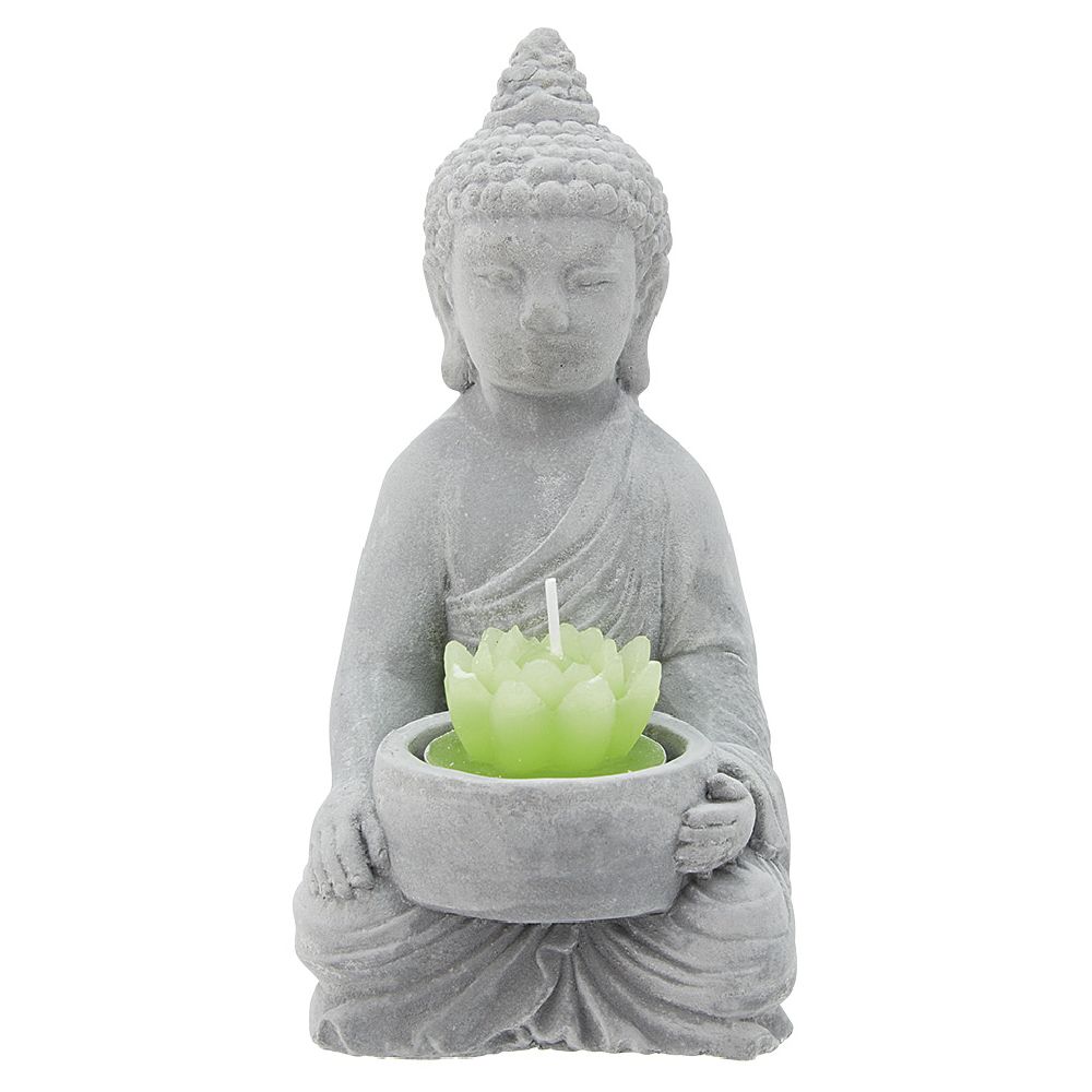 Buddha decoration with plant and candle