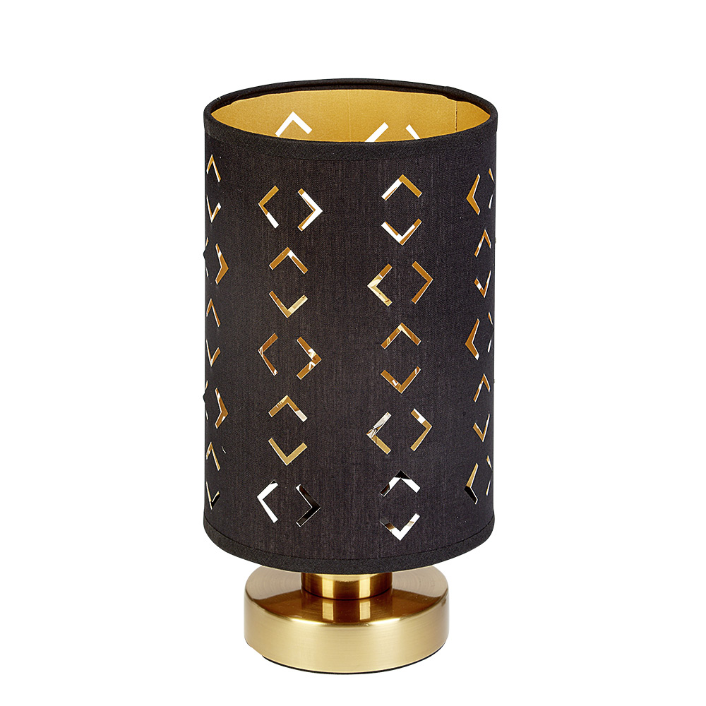 Bedside lamp with openwork black shade and gold base