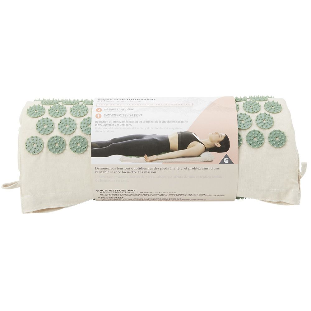 Beige and green acupressure mat