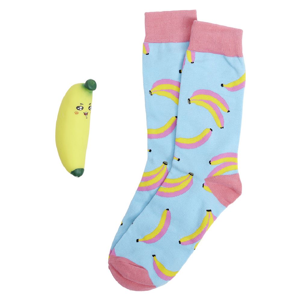 Box of socks with banana-themed anti-stress ball TU